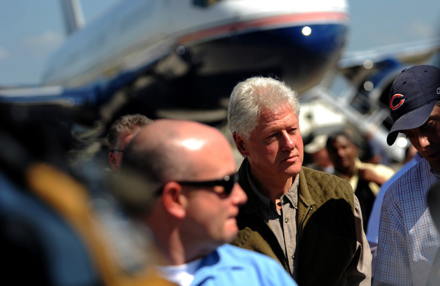 Former President Bill Clinton and his daughter, Chelsea, visit Port au Prince, Haiti, Jan. 18, 2010. As the U.N. envoy to Haiti, Clinton is surveying relief efforts and the damage caused by the Jan. 12, 2010, earthquake. (U.S. Air Force photo by Master Sgt. Jeremy Lock/Released)